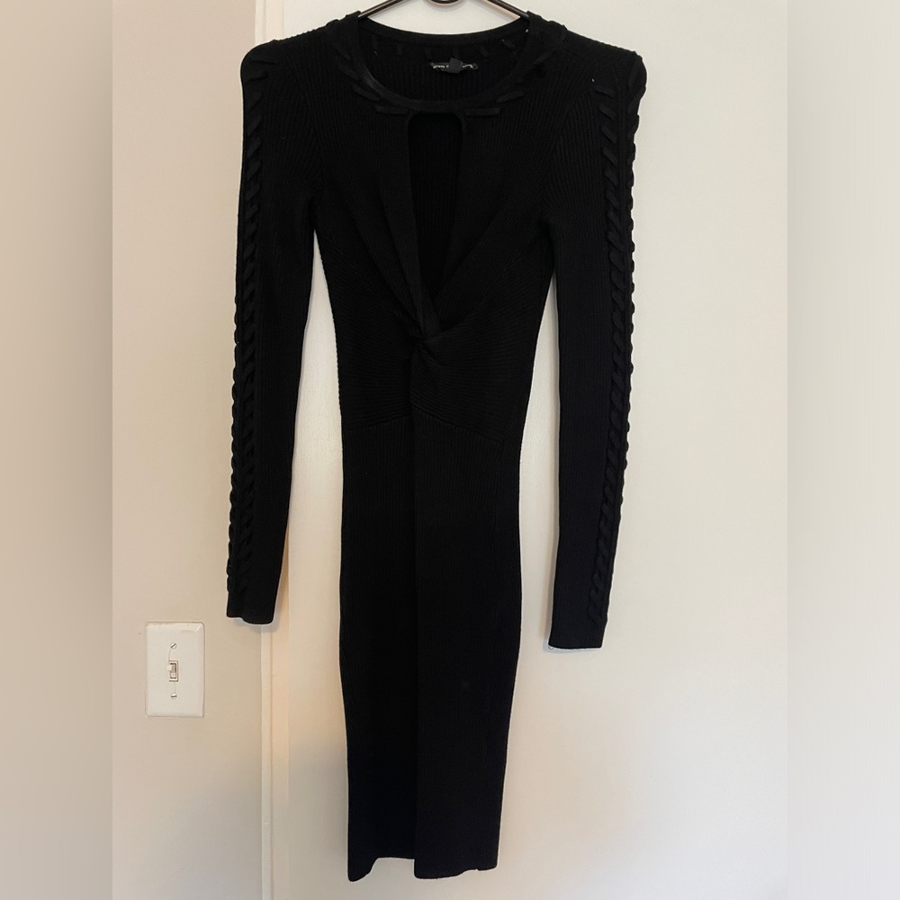 Black bodycon sweater dress with keyhole top. Brand: Guess